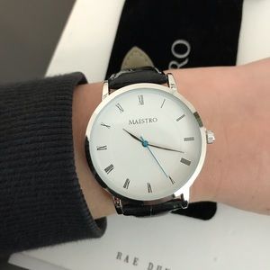 Black watch with white stitching